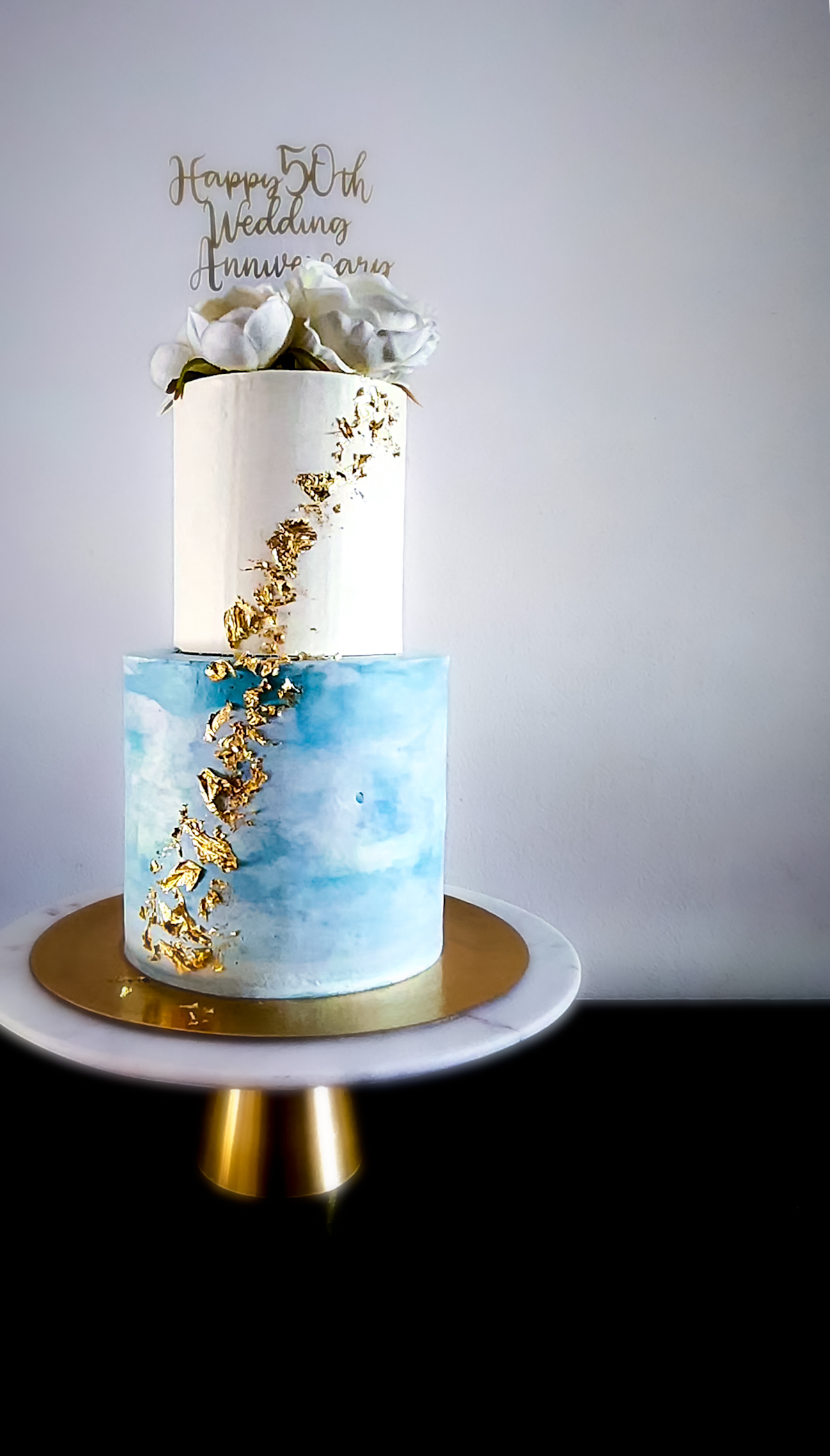 Two Tier White Blue Anniversary Cake